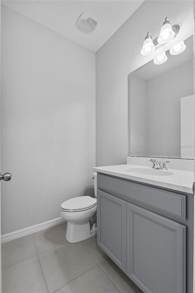 944 Benjamin Trl, Davenport, FL 33837 - bathroom with vanity and tile patterned flooring