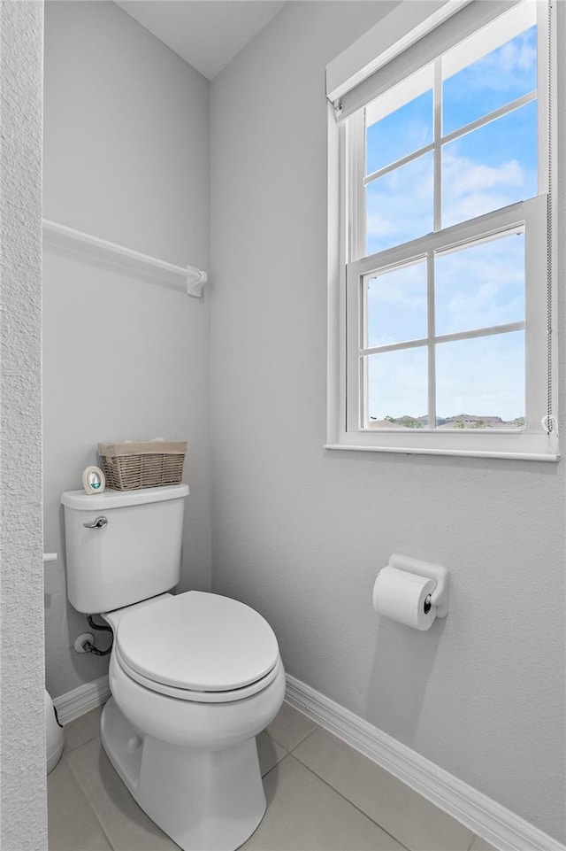 944 Benjamin Trl, Davenport, FL 33837 - bathroom with toilet and tile patterned flooring