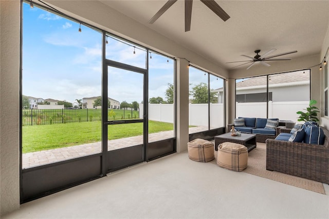 944 Benjamin Trl, Davenport, FL 33837 - sunroom featuring a ceiling fan and outdoor lounge area