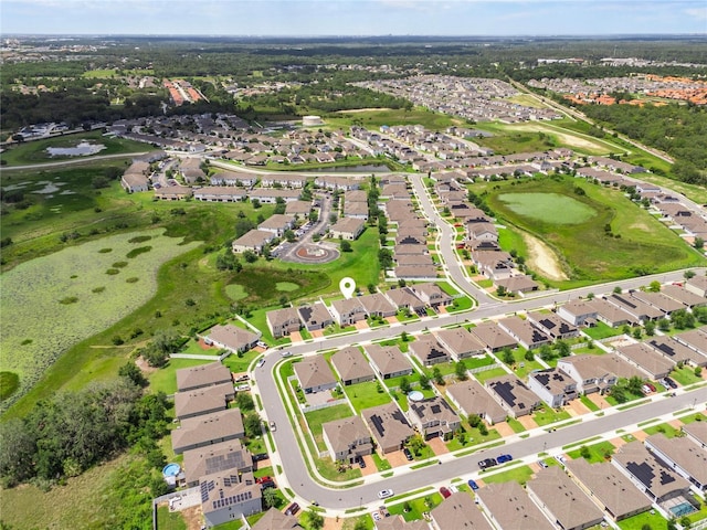944 Benjamin Trl, Davenport, FL 33837 - aerial view of residential area featuring a golf club and a large body of water