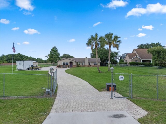 2921 Lake Tohopekaliga Blvd, Kissimmee, FL 34746 - view of property's community with decorative driveway