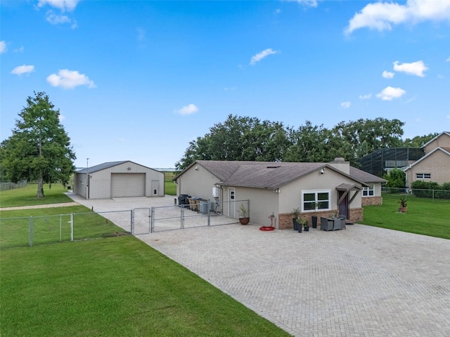 2921 Lake Tohopekaliga Blvd, Kissimmee, FL 34746 - view of front of home with a gate, a garage, an outdoor structure, brick siding, and a chimney