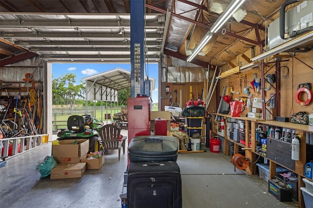 2921 Lake Tohopekaliga Blvd, Kissimmee, FL 34746 - garage featuring a workshop area