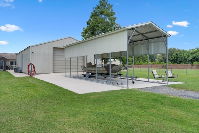 2921 Lake Tohopekaliga Blvd, Kissimmee, FL 34746 - view of community featuring an outdoor structure, a detached garage, a carport, and a pole building