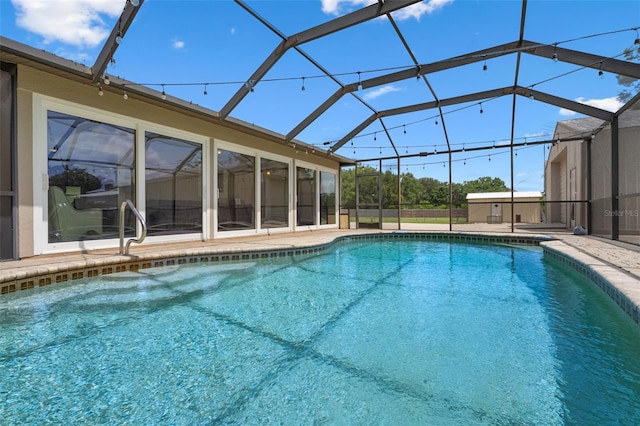 2921 Lake Tohopekaliga Blvd, Kissimmee, FL 34746 - outdoor pool featuring a patio area and glass enclosure