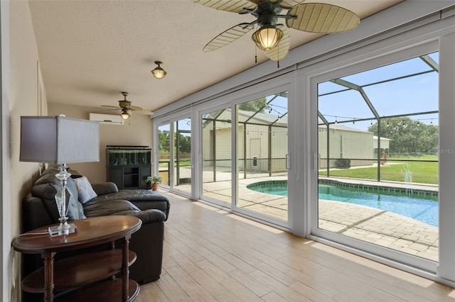 2921 Lake Tohopekaliga Blvd, Kissimmee, FL 34746 - sunroom / solarium featuring a ceiling fan and a swimming pool