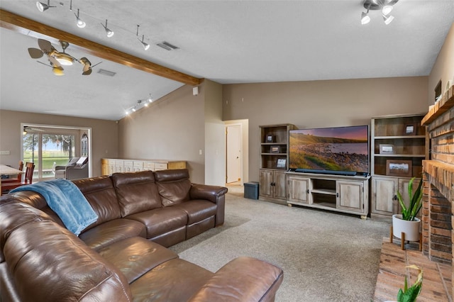 2921 Lake Tohopekaliga Blvd, Kissimmee, FL 34746 - carpeted living area with a fireplace