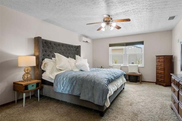 2921 Lake Tohopekaliga Blvd, Kissimmee, FL 34746 - carpeted bedroom featuring a wall mounted AC, a textured ceiling, and ceiling fan