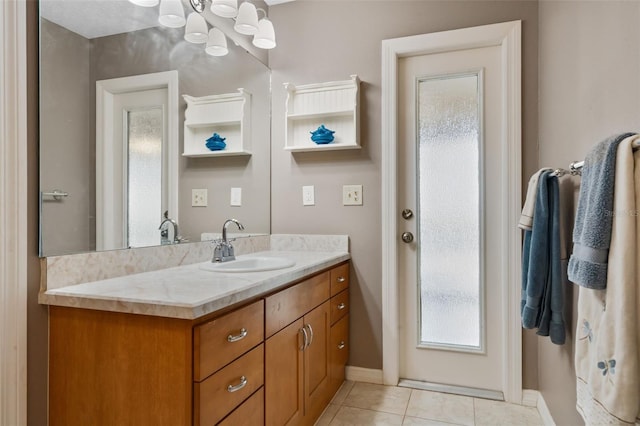 2921 Lake Tohopekaliga Blvd, Kissimmee, FL 34746 - bathroom with vanity, plenty of natural light, and tile patterned floors
