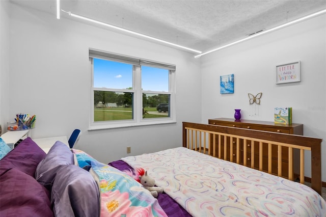 2921 Lake Tohopekaliga Blvd, Kissimmee, FL 34746 - bedroom with a textured ceiling