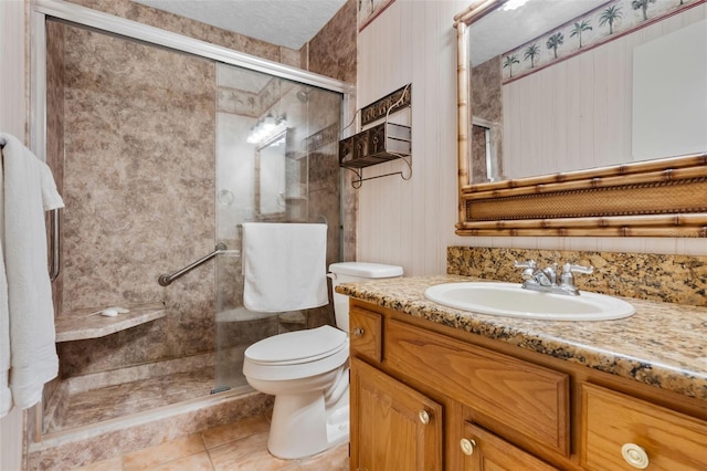 2921 Lake Tohopekaliga Blvd, Kissimmee, FL 34746 - full bath with vanity, a shower stall, and tile patterned flooring