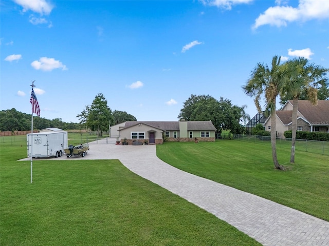 2921 Lake Tohopekaliga Blvd, Kissimmee, FL 34746 - view of yard with driveway and a patio area