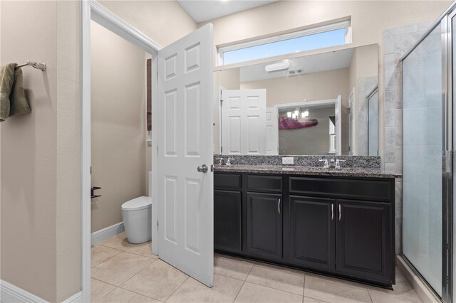 14536 Golden Harbor Ln, Winter Garden, FL 34787 - full bath featuring double vanity, a shower stall, and tile patterned flooring