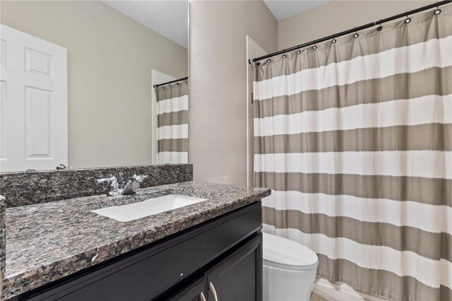 14536 Golden Harbor Ln, Winter Garden, FL 34787 - bathroom featuring vanity and a shower with shower curtain