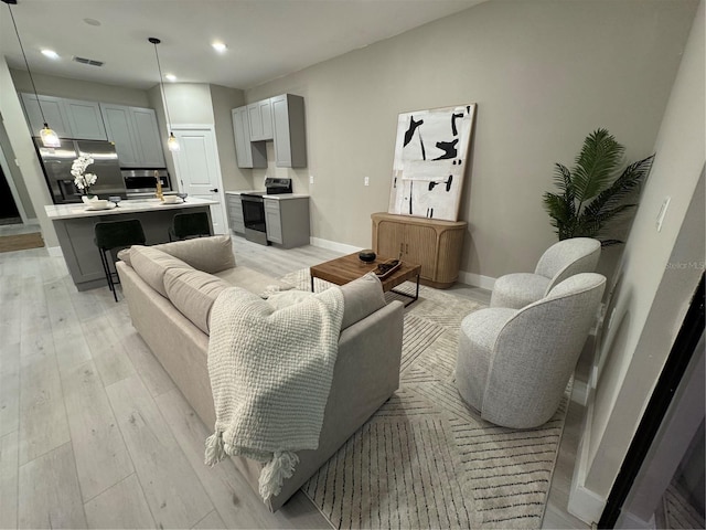 1526 Hempel Ave, Gotha, FL 34734 - living room with recessed lighting and light wood-style flooring