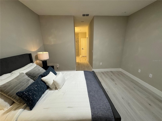 1526 Hempel Ave, Gotha, FL 34734 - bedroom with light wood-type flooring and baseboards