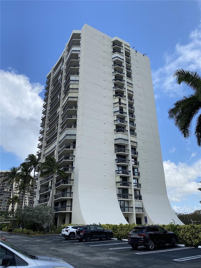 2400 Presidential Way Unit 1104, West Palm Beach, FL 33401 - view of apartment building / complex with uncovered parking