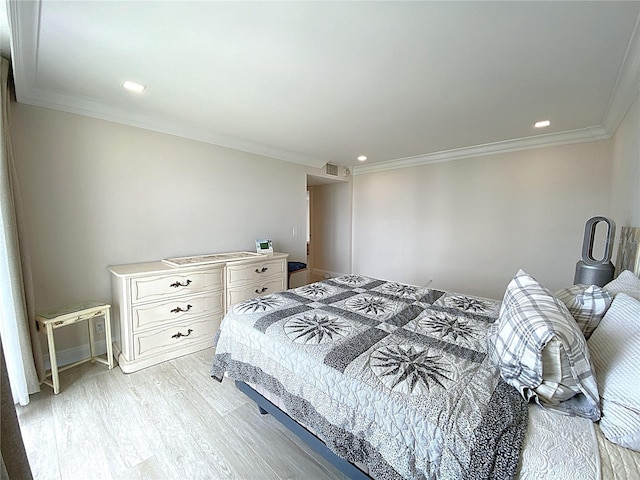 2400 Presidential Way Unit 1104, West Palm Beach, FL 33401 - bedroom featuring light wood-style floors, ornamental molding, and recessed lighting