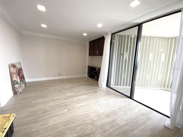 2400 Presidential Way Unit 1104, West Palm Beach, FL 33401 - unfurnished living room with ornamental molding, light wood-type flooring, and recessed lighting
