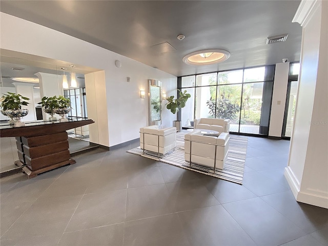 2400 Presidential Way Unit 1104, West Palm Beach, FL 33401 - lobby with a wall of windows