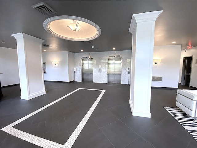 2400 Presidential Way Unit 1104, West Palm Beach, FL 33401 - garage featuring elevator and recessed lighting