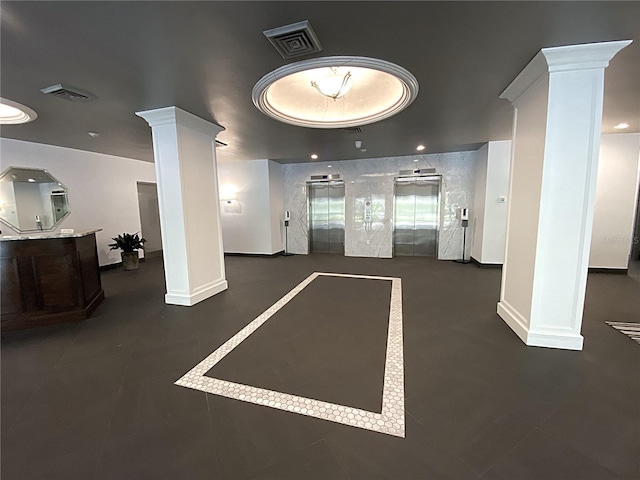 2400 Presidential Way Unit 1104, West Palm Beach, FL 33401 - building lobby with recessed lighting