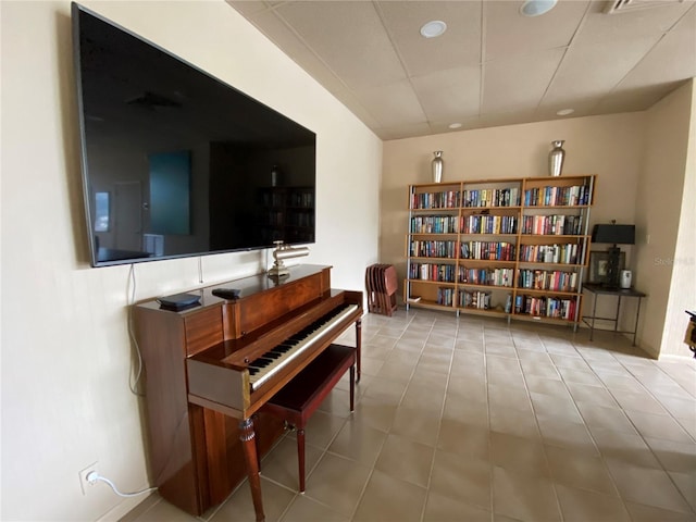 2400 Presidential Way Unit 1104, West Palm Beach, FL 33401 - living area with a drop ceiling