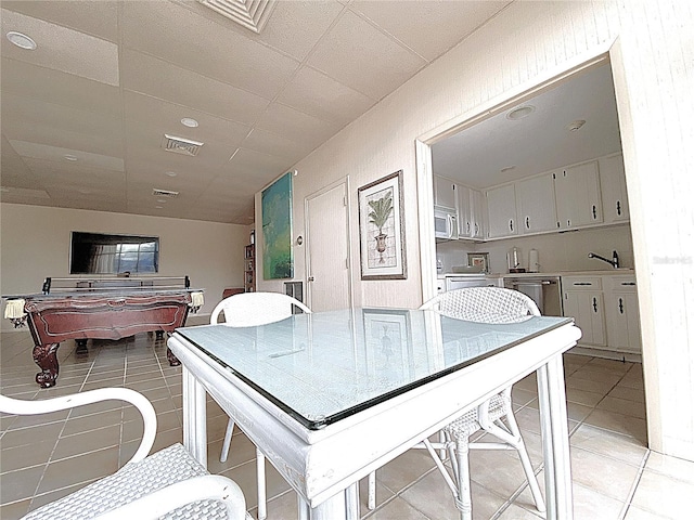 2400 Presidential Way Unit 1104, West Palm Beach, FL 33401 - dining area with light tile patterned floors