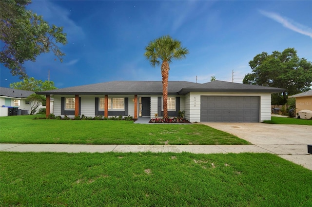 5938 Marlberry Dr, Orlando, FL 32819 - single story home with a garage, driveway, and a front lawn