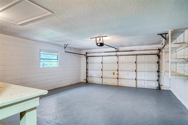 5938 Marlberry Dr, Orlando, FL 32819 - garage with concrete block wall and a garage door opener