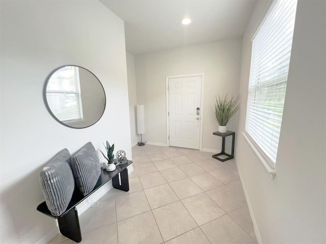 17504 Butterfly Pea Ct, Clermont, FL 34714 - entryway featuring light tile patterned floors and recessed lighting