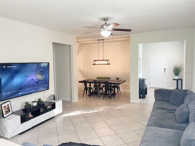 17504 Butterfly Pea Ct, Clermont, FL 34714 - living room with light tile patterned floors and a ceiling fan