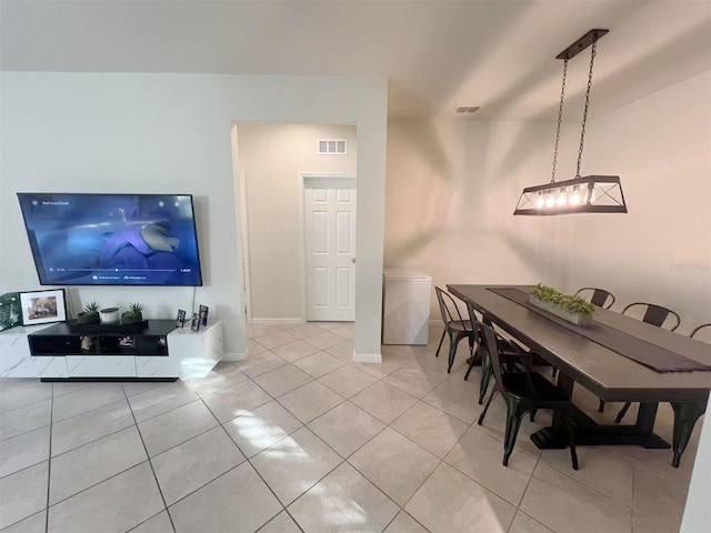 17504 Butterfly Pea Ct, Clermont, FL 34714 - dining room featuring light tile patterned flooring and baseboards