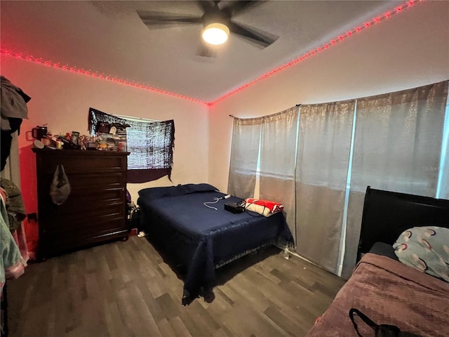 223 Hope Cir, Orlando, FL 32811 - bedroom with wood finished floors, vaulted ceiling, and ceiling fan