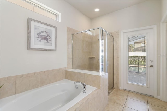 2108 Morocco Way, Kissimmee, FL 34747 - bathroom with a bath, a shower stall, and healthy amount of natural light