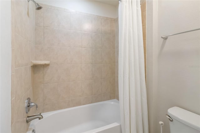 2108 Morocco Way, Kissimmee, FL 34747 - bathroom featuring shower / tub combo with curtain