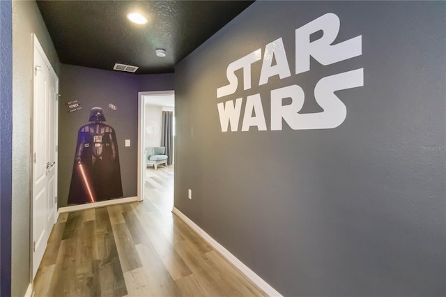 2108 Morocco Way, Kissimmee, FL 34747 - corridor featuring wood finished floors and baseboards