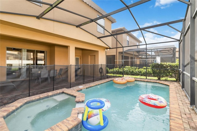 2108 Morocco Way, Kissimmee, FL 34747 - view of swimming pool featuring a patio area, a lanai, and a pool with connected hot tub