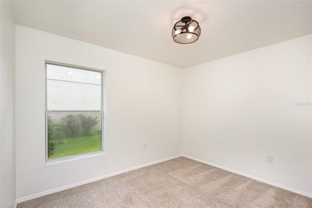 85 Levee Ln, Ormond Beach, FL 32174 - carpeted spare room featuring baseboards