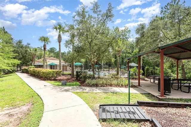 85 Levee Ln, Ormond Beach, FL 32174 - surrounding community with a patio area