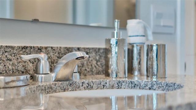 33608 Seattle Slew Dr, Sorrento, FL 32776 - bathroom view of decorative backsplash and a sink