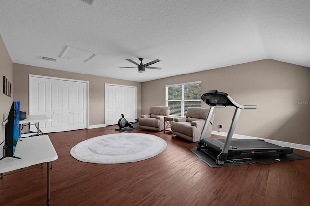1462 Palm Bay Ct, Lake Mary, FL 32746 - workout area featuring wood finished floors, a ceiling fan, attic access, vaulted ceiling, and a textured ceiling