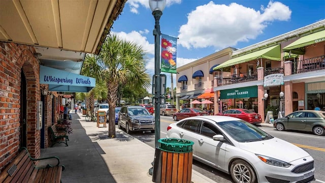 410 Winter Bliss Ln, Mount Dora, FL 32757 - view of asphalt street featuring street lighting and sidewalks