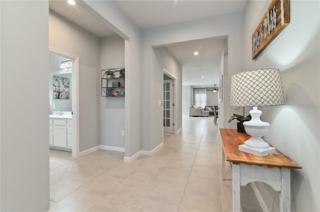 410 Winter Bliss Ln, Mount Dora, FL 32757 - hallway featuring light tile patterned floors and recessed lighting