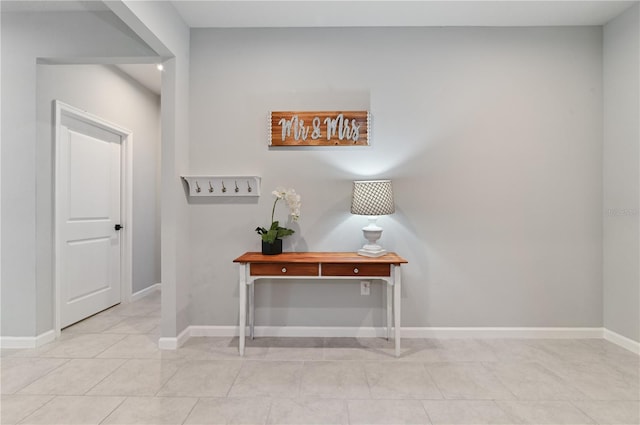 410 Winter Bliss Ln, Mount Dora, FL 32757 - hall featuring light tile patterned floors and baseboards