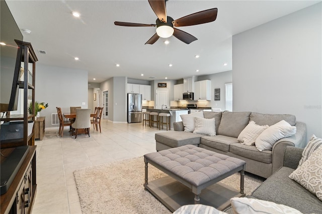 410 Winter Bliss Ln, Mount Dora, FL 32757 - living room featuring a ceiling fan, light tile patterned floors, and recessed lighting