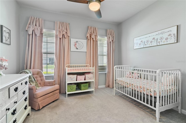 410 Winter Bliss Ln, Mount Dora, FL 32757 - carpeted bedroom featuring a crib and ceiling fan