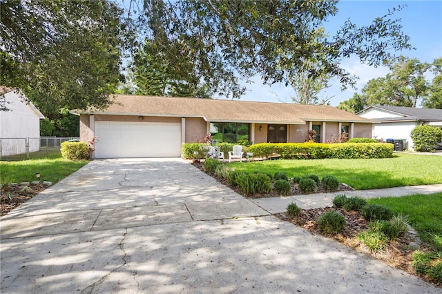 7022 Talbot Dr, Orlando, FL 32819 - single story home featuring a garage, driveway, and stucco siding
