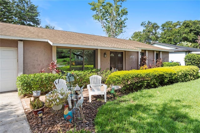 7022 Talbot Dr, Orlando, FL 32819 - ranch-style house with stucco siding, a front yard, a shingled roof, and a garage