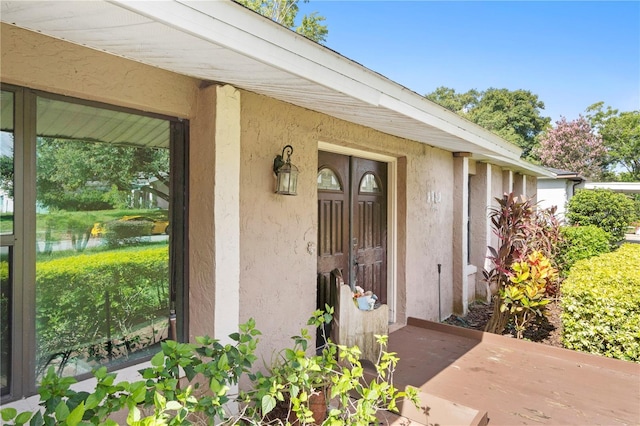 7022 Talbot Dr, Orlando, FL 32819 - property entrance featuring stucco siding